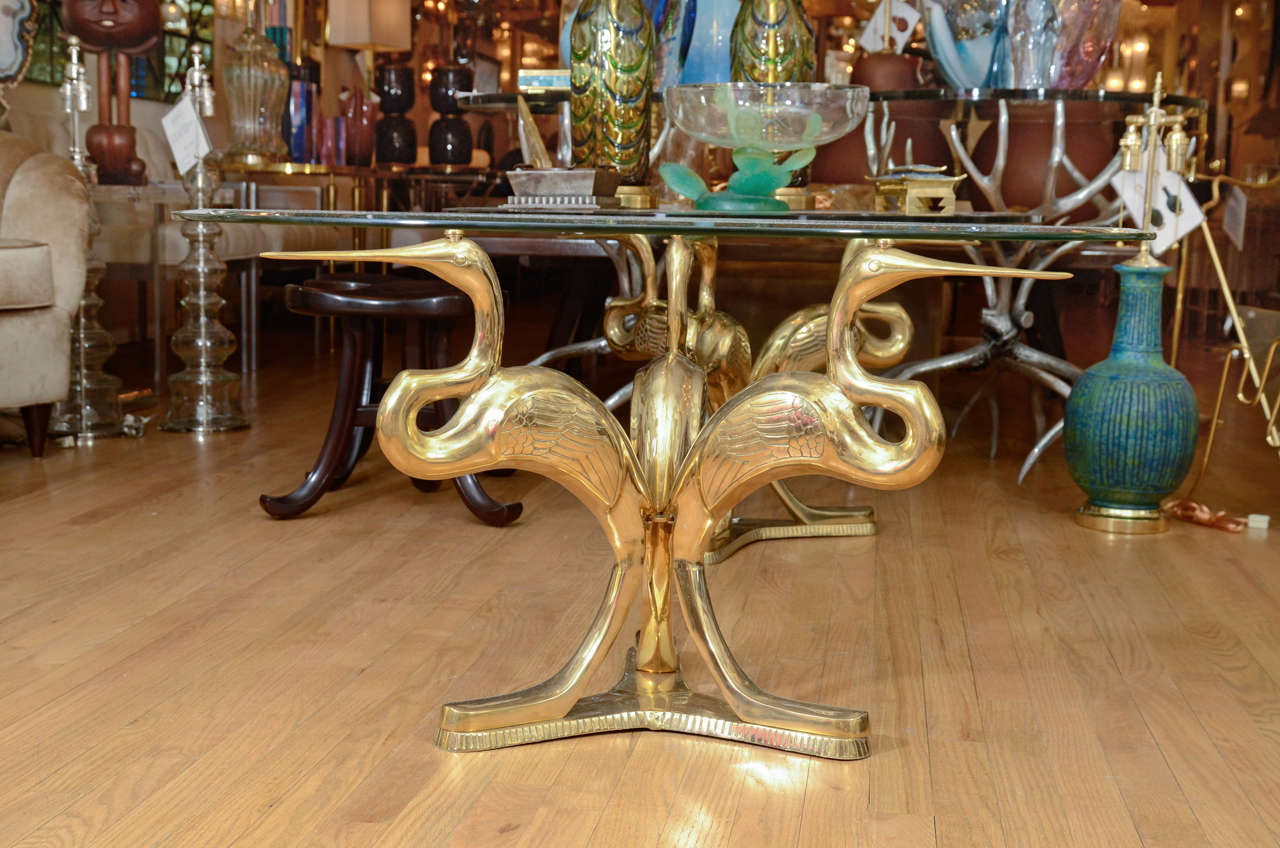 Circular Brass And Glass Side Tables With Sculpted Crane Supports