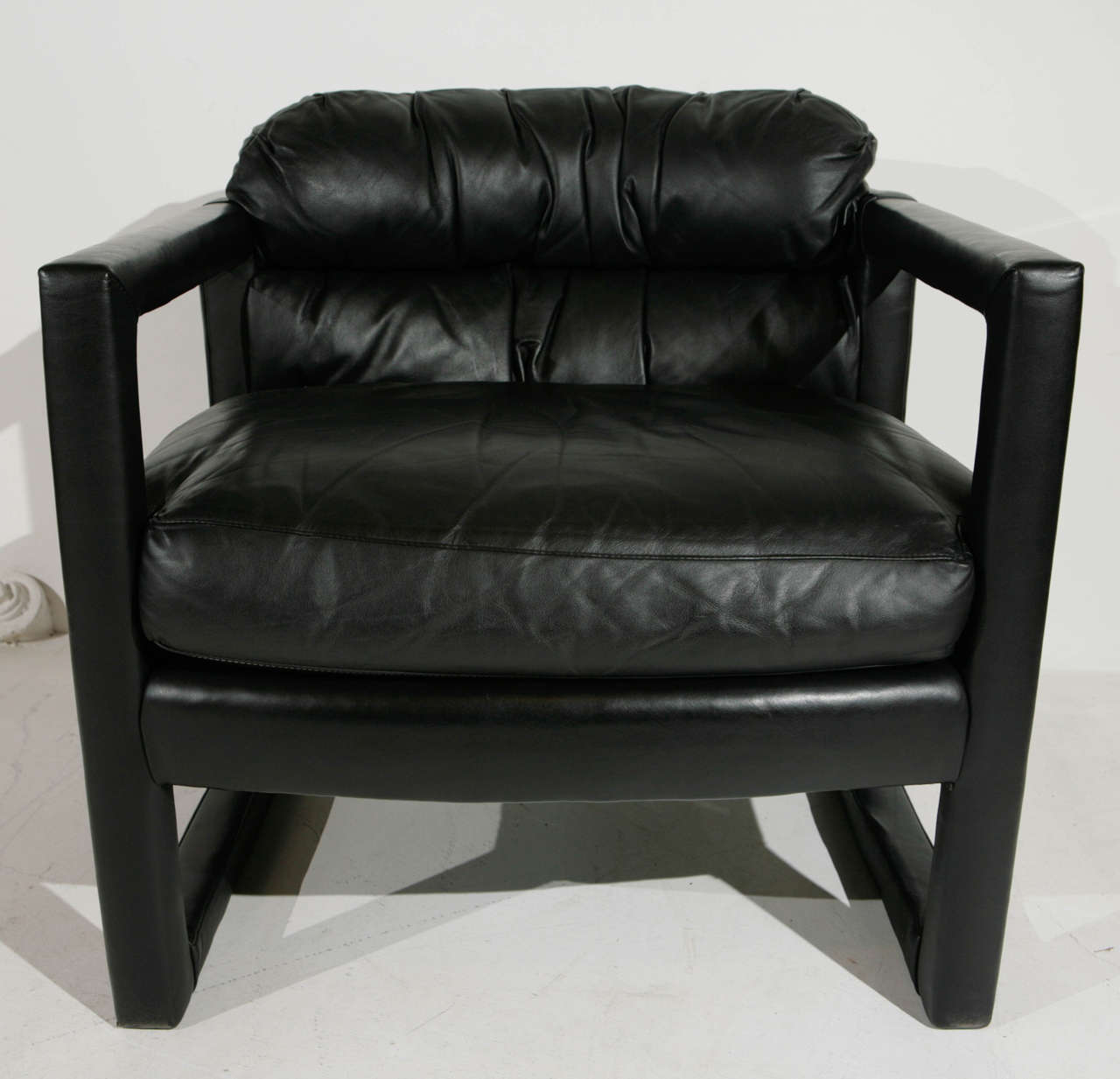 These modern chairs feature a unique silhouette with soft leather and comfortable seat. Made by the Dansen company, a division of Markwood (now Hekman) in North Carolina.