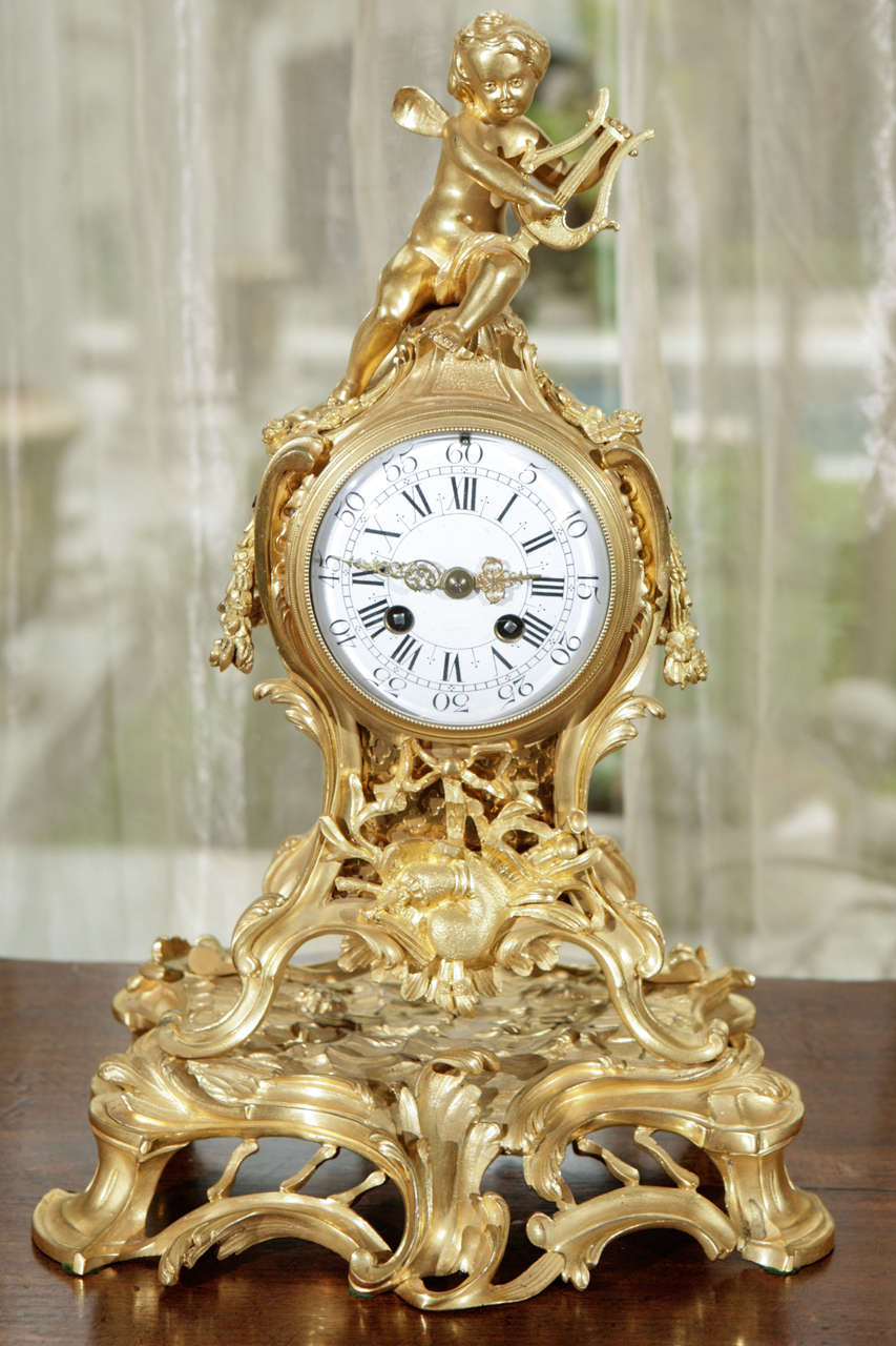 19th century French Finely Chased Dore Bronze Clock with Cherub Motif.  Clock is in working order.
