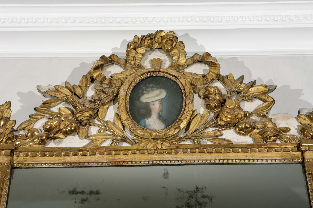 Carved 18th Century French Giltwood Mirror with Portrait of a Lady For Sale