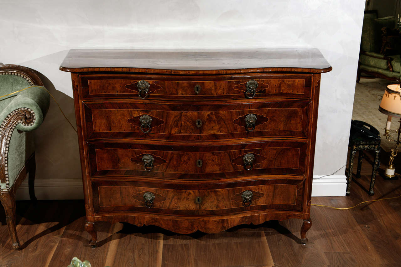 18th c. Italian 4 Drawer Serpentine Front Commode.  The Commode is made of Burlwood with Fruitwood Inlays.  