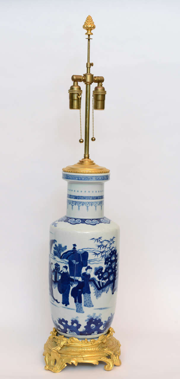 20th Century Pair of Chinese Blue and White Porcelain Bronze-Mounted Lamps For Sale