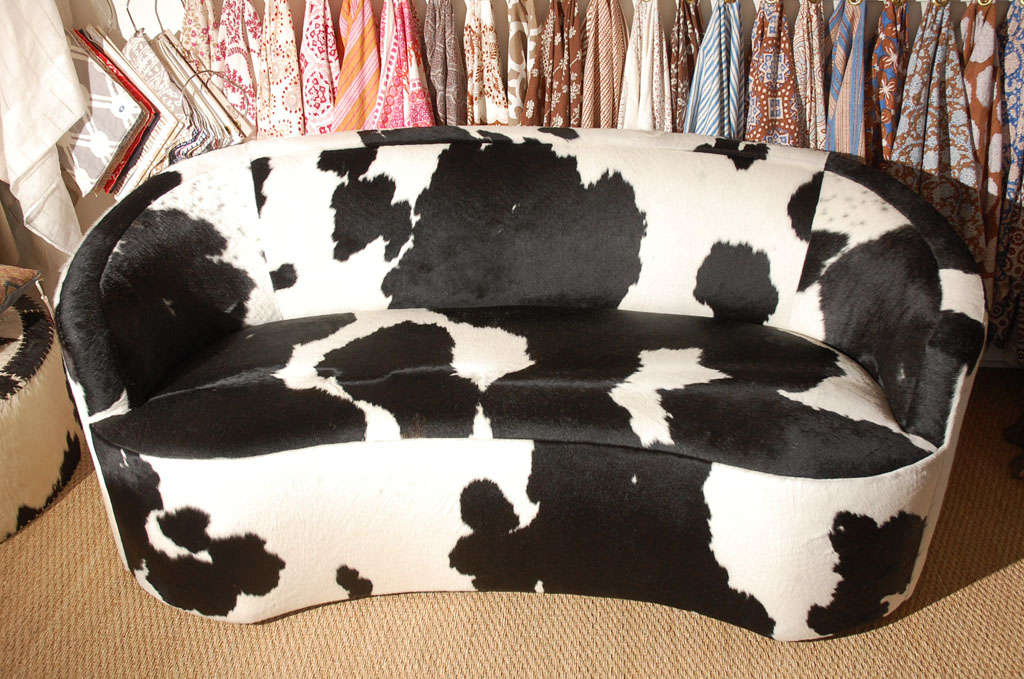 Vintage sofa upholstered in cowhide