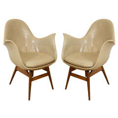 A Pair of Danish Style Leather Upholstered Chairs.