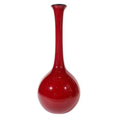 A Venetian Glass cased red vase.