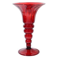 A red Venetian Glass vase.