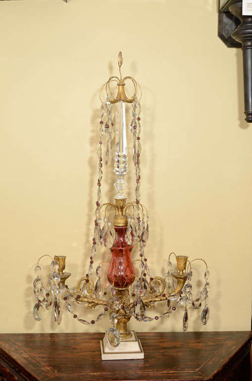 Pair of bronze girandoles with cranberry glass & clear crystals