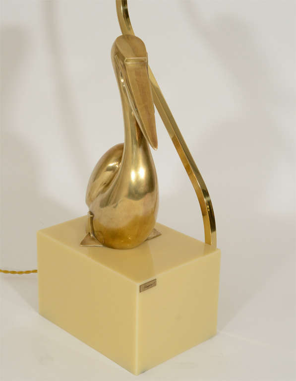 Brass Pelican Lamp on Cream-Colored Plastic Base 2
