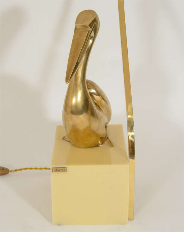 Brass Pelican Lamp on Cream-Colored Plastic Base 3
