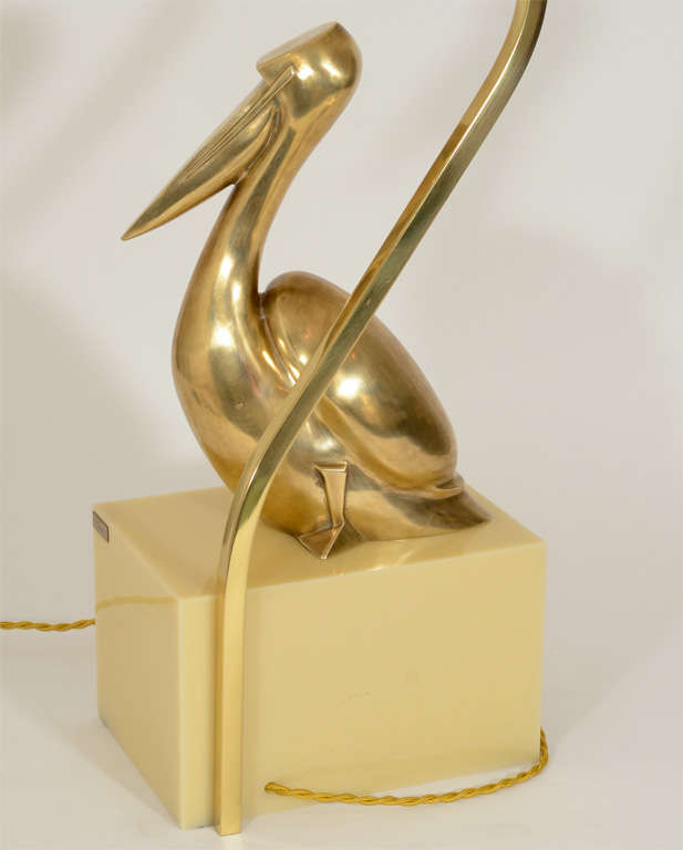 Brass Pelican Lamp on Cream-Colored Plastic Base 5