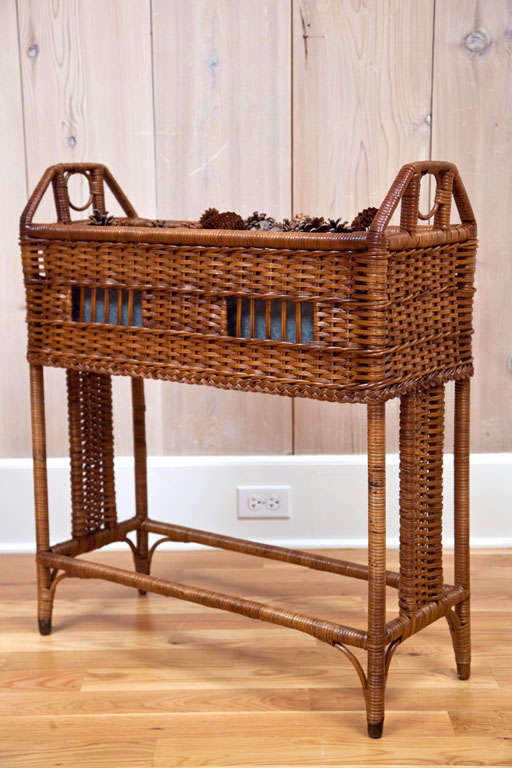 Antique Reed Wicker Planter with original tin liner.