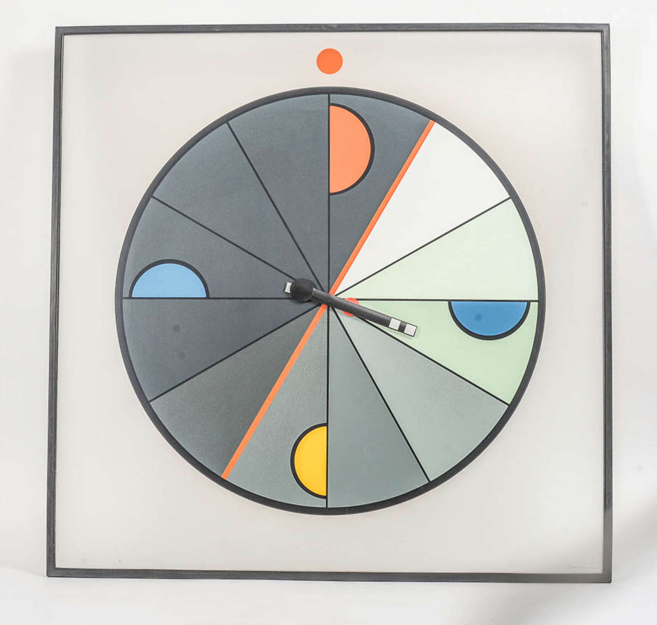 This outstanding abstract circular clock was designed by Kurt B. Delbanco in 1980 for Morphos. 
Clock painted on a frame lucite panel of 32 x 32 inches. 
Battery operated.