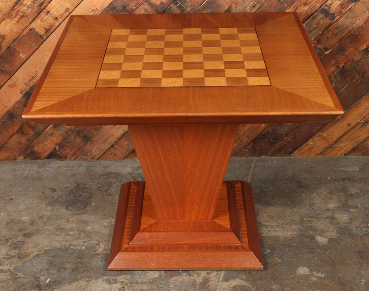 Vintage chess and game table in teak and bird's-eye maple inlay. Has darkwood thin inlay border around playing field. 
Gorgeous grain throughout. Modern design with a deco inspiration.
Custom-made in the 1980s and in remarkable