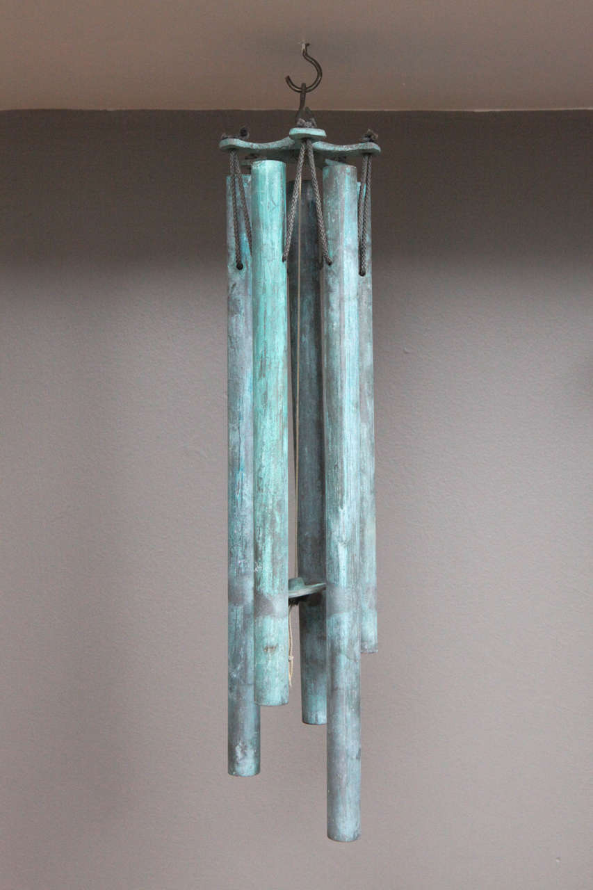 Beautifully patinated copper wind chime.