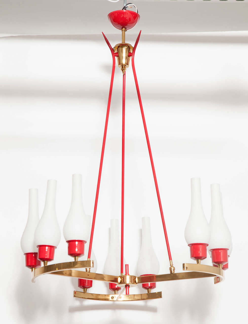 Brass and red enameled chandelier with nine opaline glass. This piece has been restored to perfection, wired to the American standard.

This item is located in Manhattan at 1stdibs@NYDC showroom. 
200 Lexington Ave - 10th floor, NYC.
