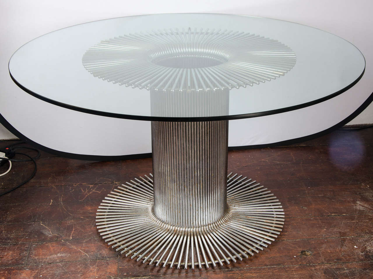 Italian 1950s chrome metal base crystal top round table.