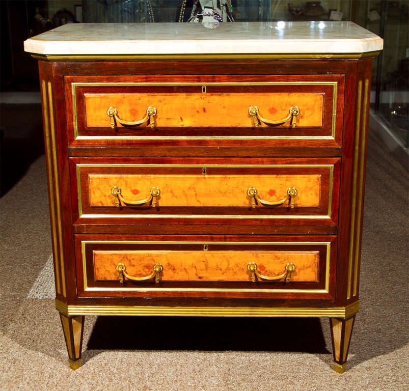 One of a kind  Russian neoclassical three-drawer commode or bedside stand. Finely cast bronze mounts. Having marble tops supported by three drawers of framed mahogany with center burl wood interior with matching sides. Leading to bronze mounted