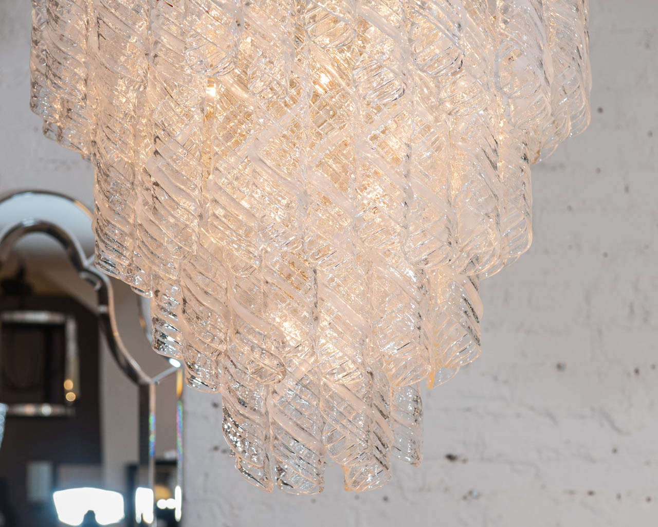 This large and impressive Murano pendant has 91 clear glass drops infused with a subtle 