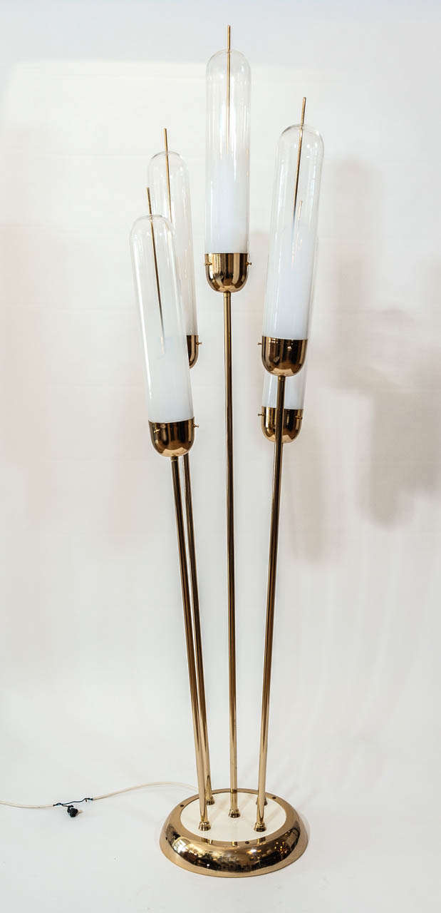 This marvelous  five light floor lamp with hand blown glass shades from Murano
and gold plated stems define this rare  sculptural