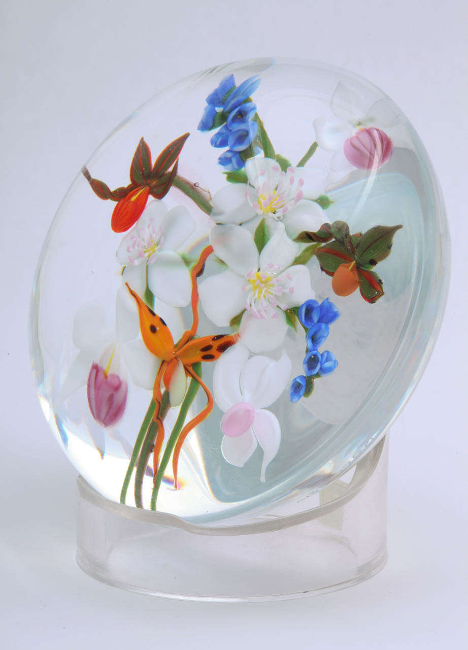 a unique Paul Standard orchid bouquet paperweight made up of a variety of orchids, signed S for Stankard, 1/1, 1980