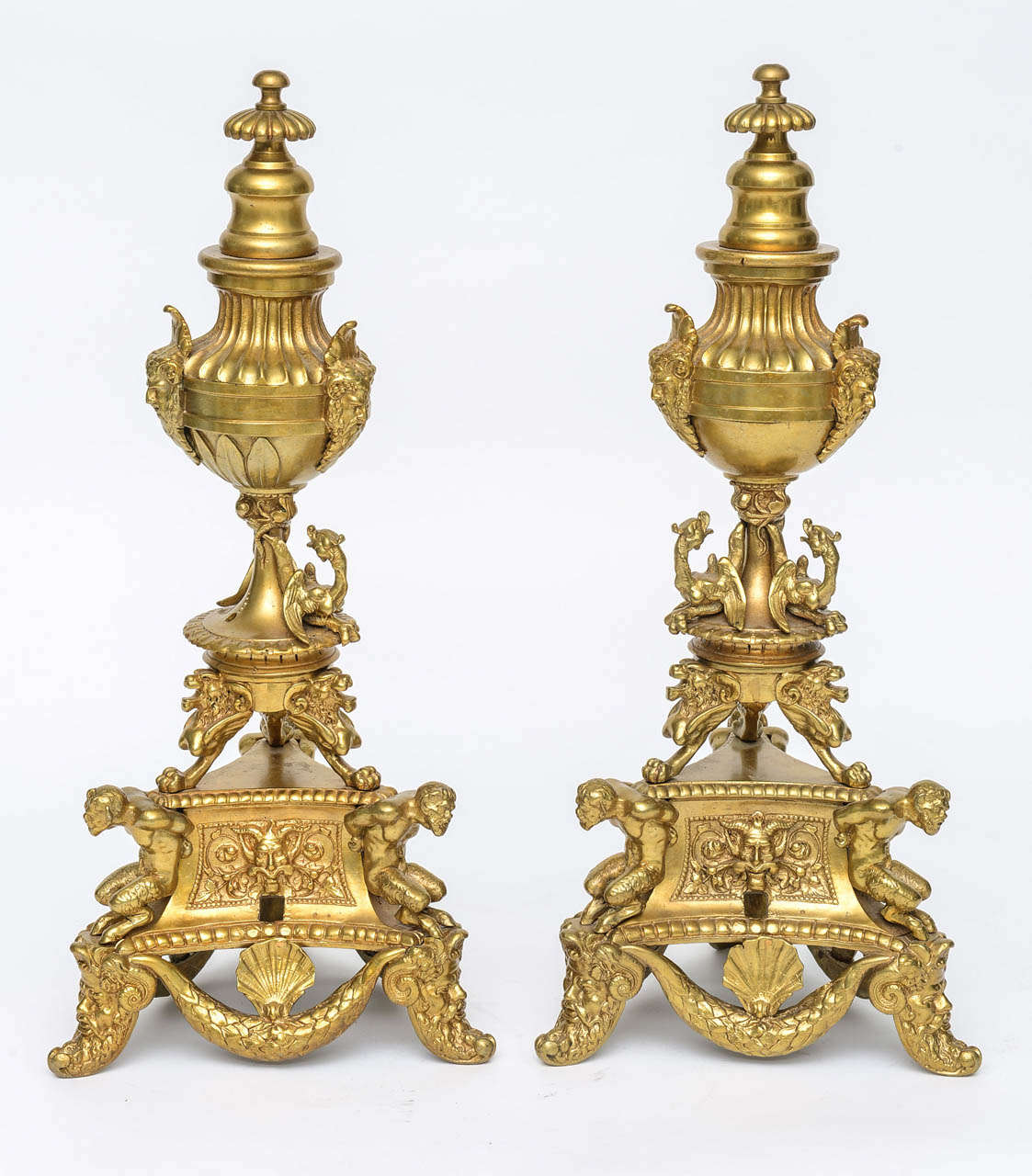 These highly articulated gilt bronze andirons are based on a 16th century design for candlesticks by the great Italian renaissance sculptor Andrea Briosco known as Riccio (1470-1532).  Riccio's great masterpiece is the Paschal candelabrum in the