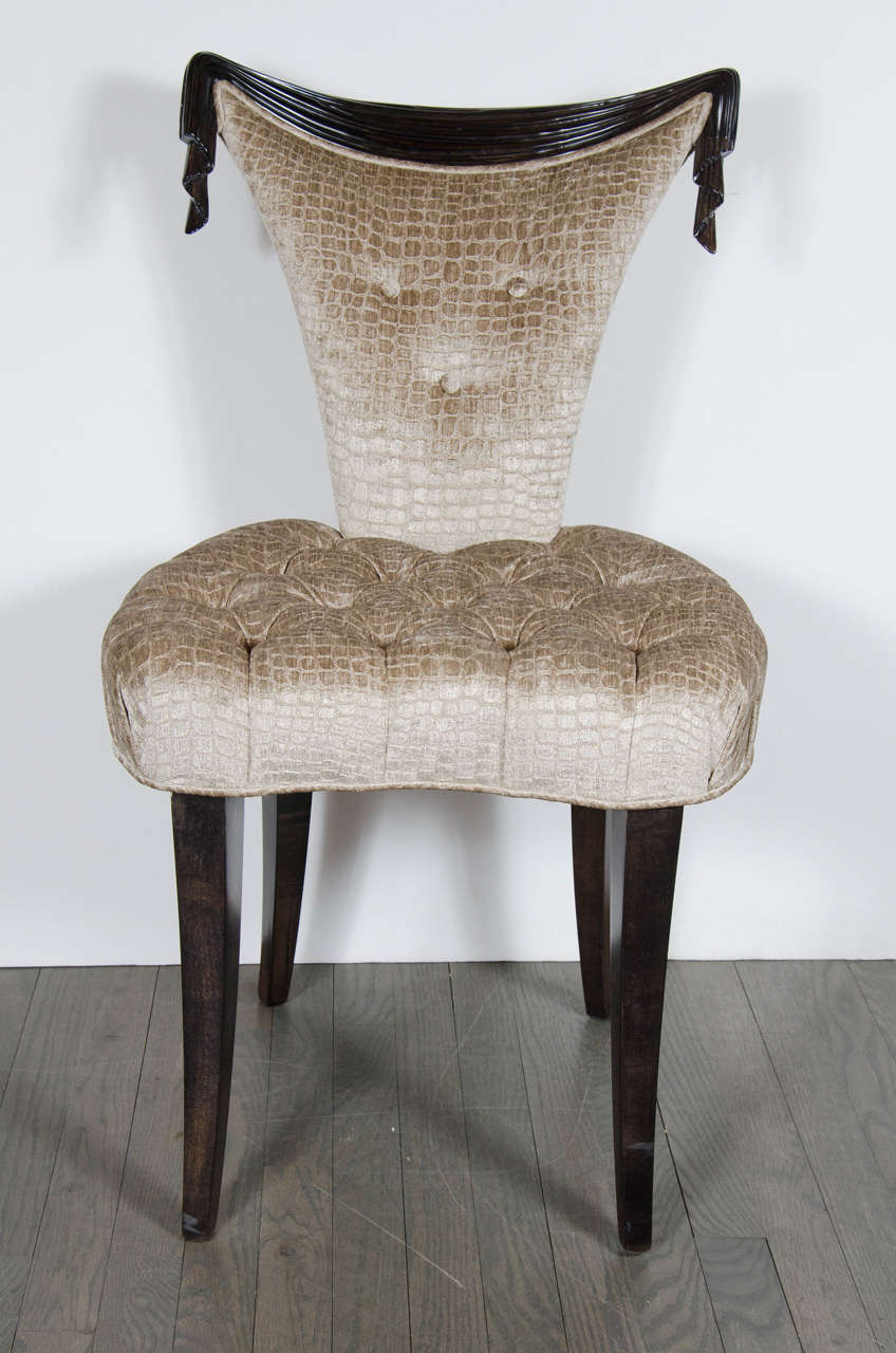 1940s Hollywood Regency draped design chair by Grosfeld House in ebonized walnut and smoked topaz gauffraged crocodile velvet upholstery. This elegant 1940s Hollywood Regency chair by Grosfeld House features a stunning hand carved draped design back