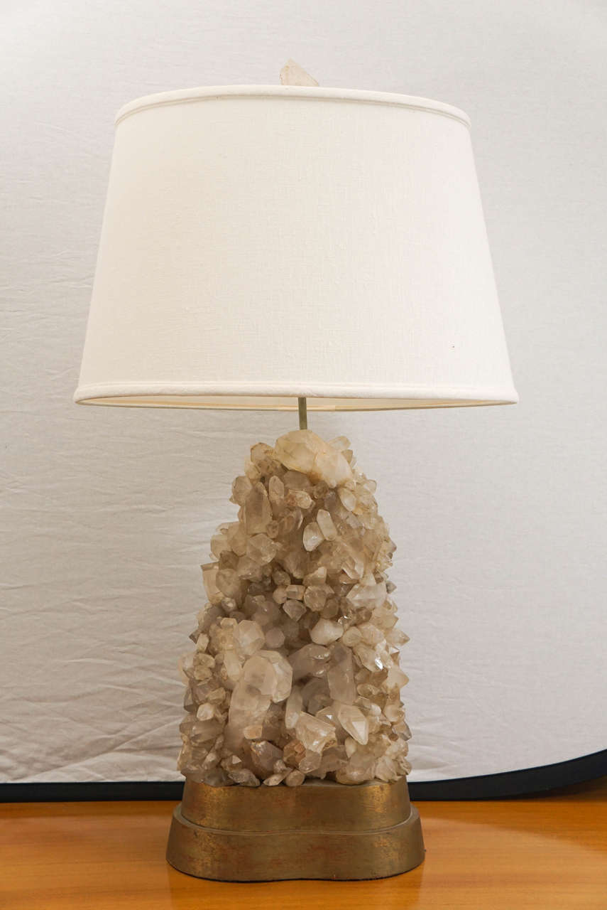 Rock crystal lamp with giltwood base by Carole Stupell.