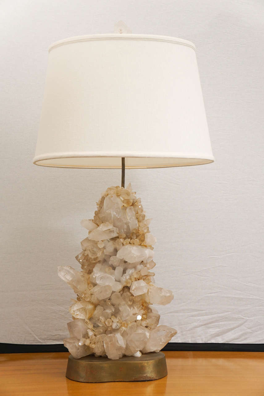Rock crystal lamp on gold leaf base by Carole Stupell.