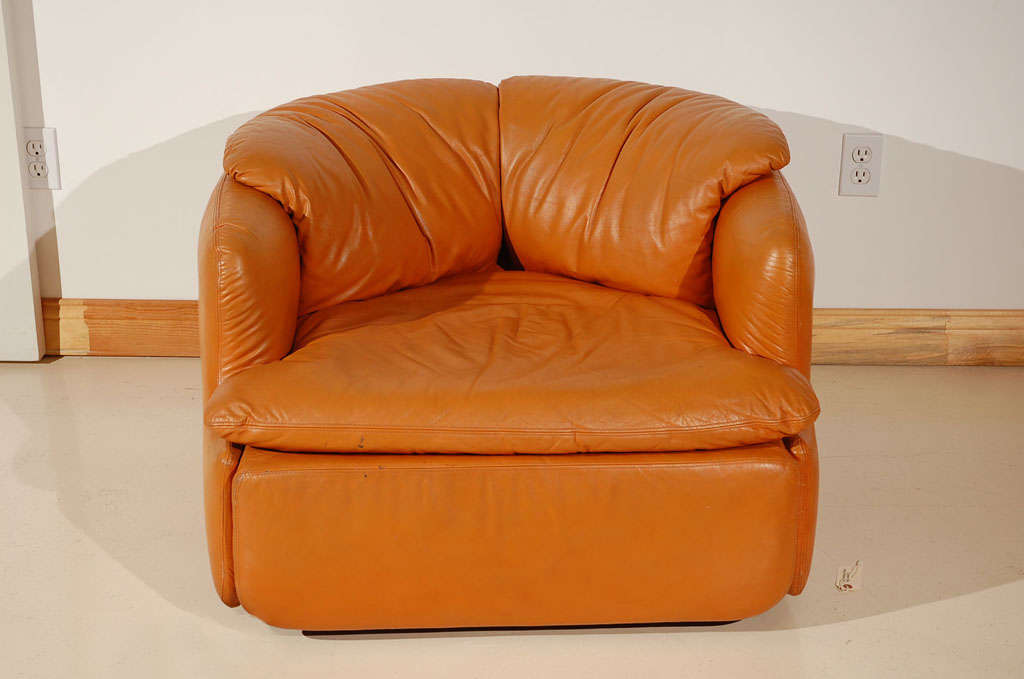 Leather chair in camel leather. Designer by Alberto Roselli for Saporiti. Matching small sofa also available.