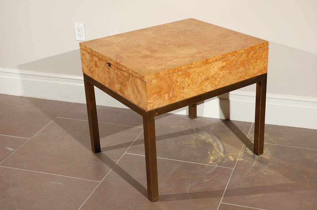 Pair of stunning end/side tables by Milo Baughman.  Beautiful maple burl with brass legs and drawer pull.  Each with one drawer.