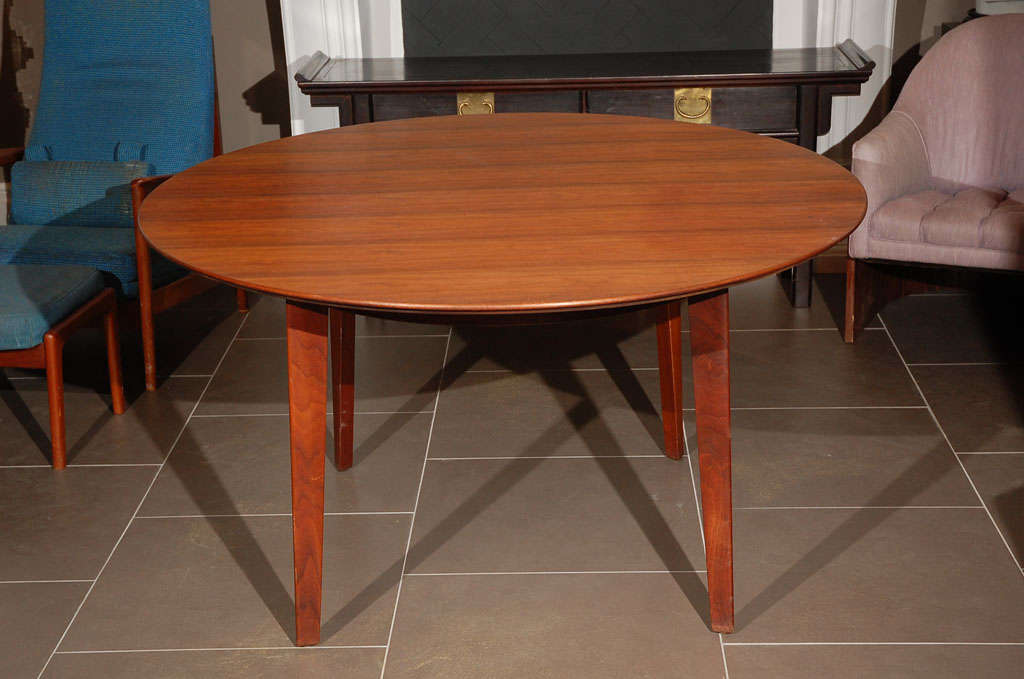 Slightly oval Dunbar dining table.  Will take leaves.