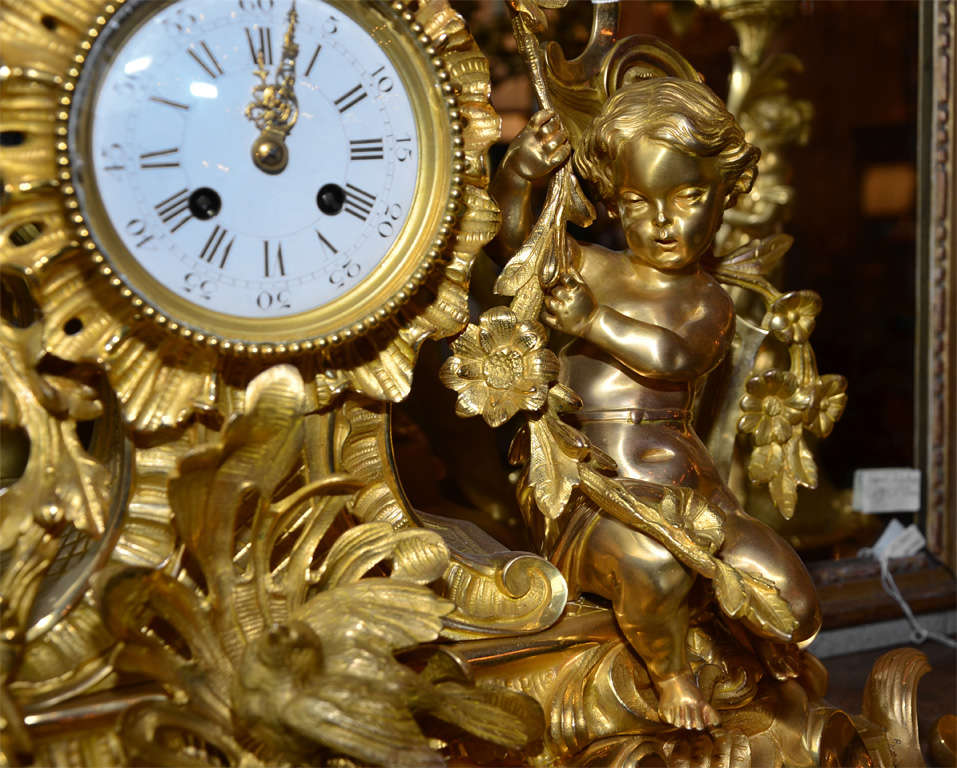 gilded  bronze  mantel  clock, decorated with 