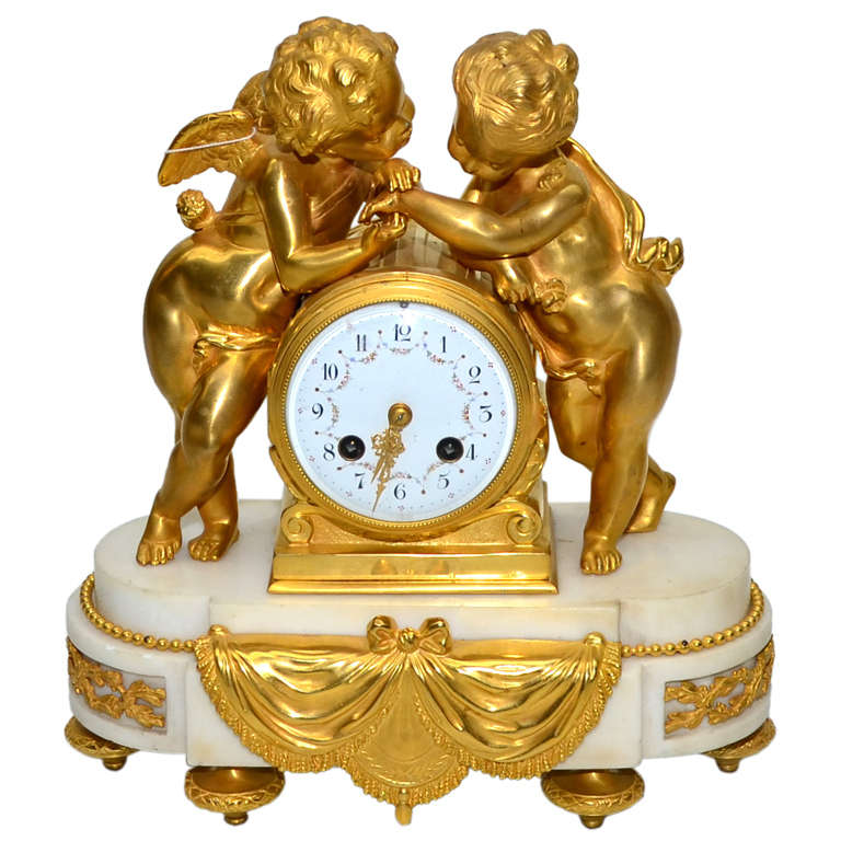 Gilded Bronze on  Marble base  Clock - Louis XVI Style For Sale