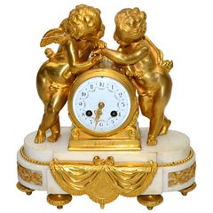 Gilded Bronze on  Marble base  Clock - Louis XVI Style