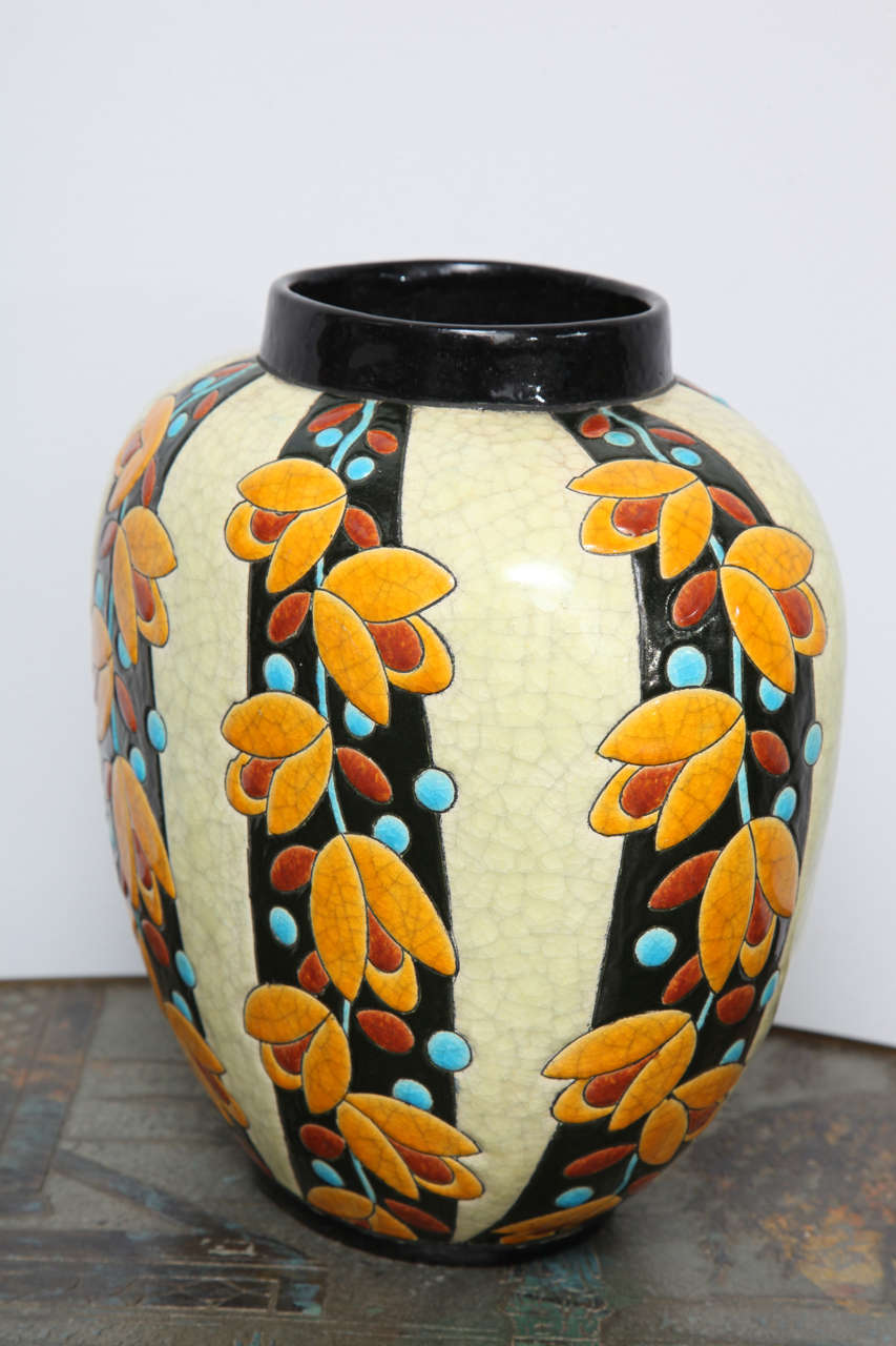 A great Boch Freres vase with floral decoration over crackle glaze 