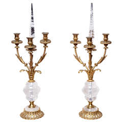 Pair of French bronze and rock crystal four light candelabras