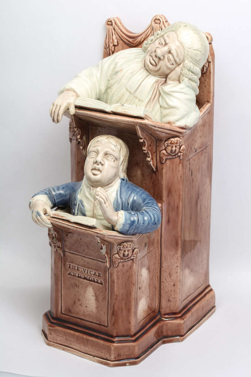 A fine Ralph Wood Pottery Vicar and Moses group decorated in translucent glazes.