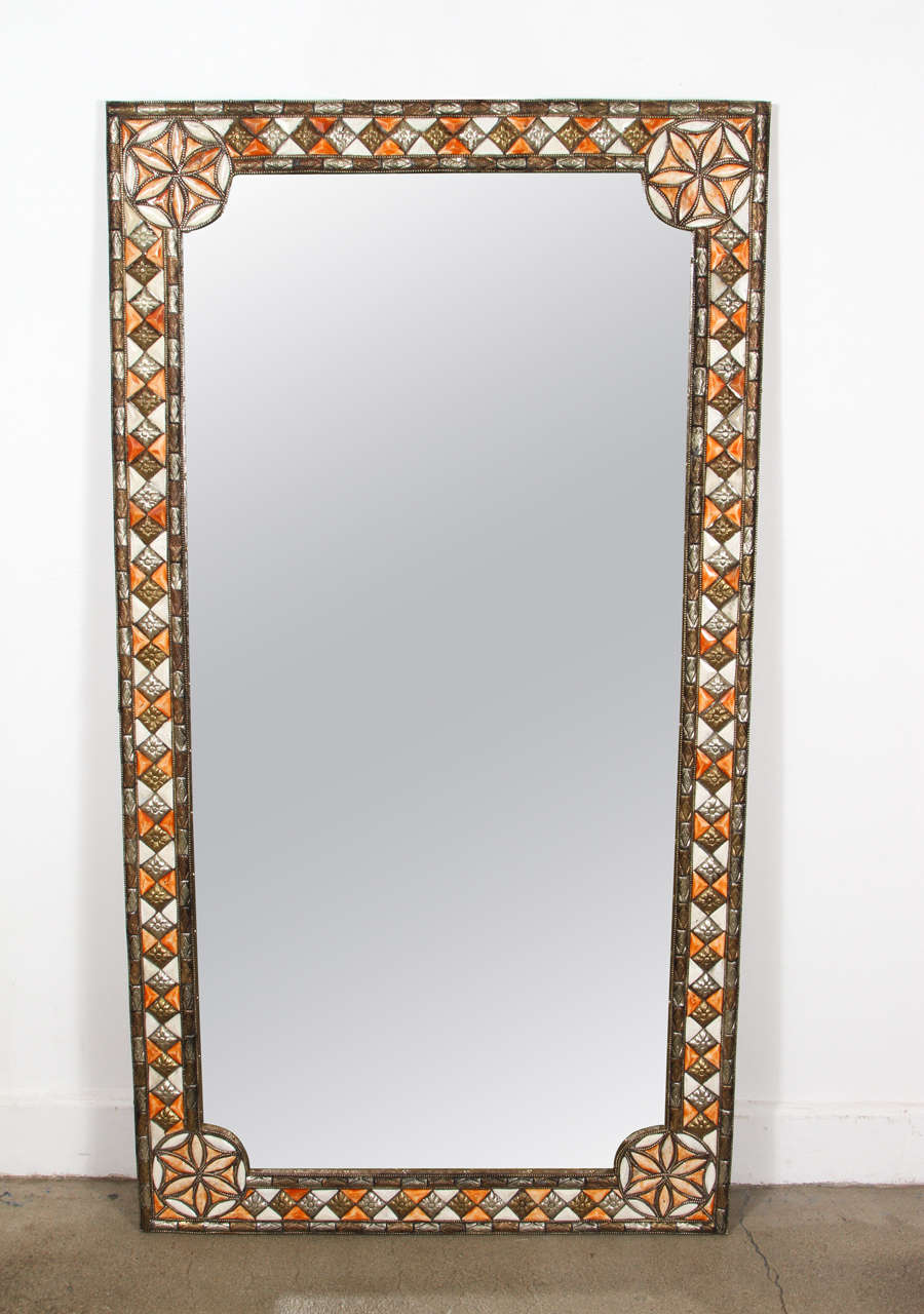 Large Moroccan mirror inlaid with camel bone in white and amber color with brass embossed metal .
Moorish Style mirror that could be used in horizontal or vertical way.

Moorish, Spanish, African, Islamic, Arabian, Middle Eastern, Egyptian,