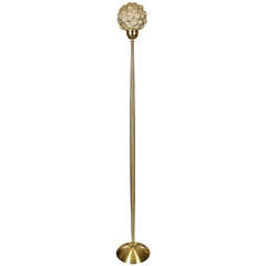 Graceful brass floor lamp with a Limburg  Bubble glass shade.