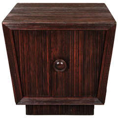 Trapezoid cabinet  by James Mont.