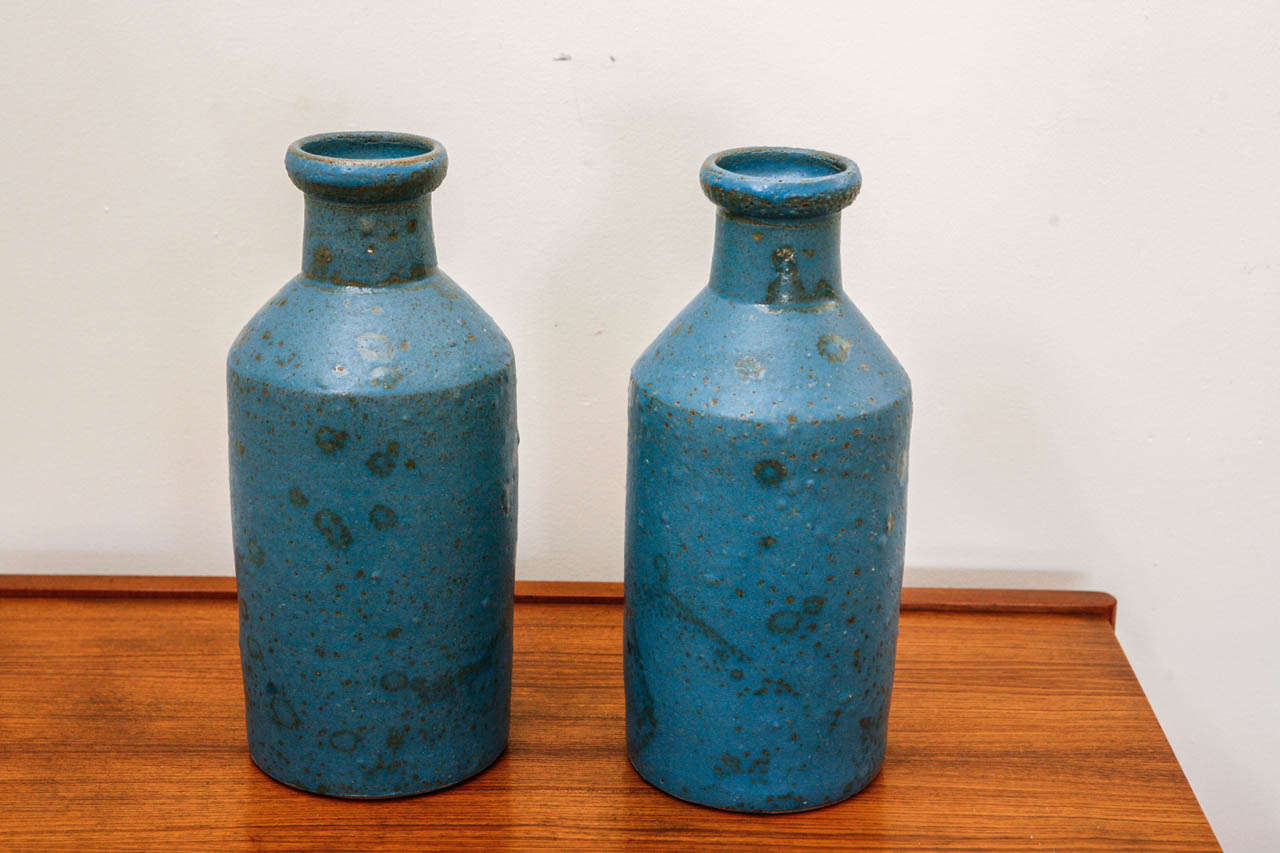 These vintage Italian vases are stand-alone gorgeous. The glaze is a wonderful azure, mottled and resplendent, with a slight texture.