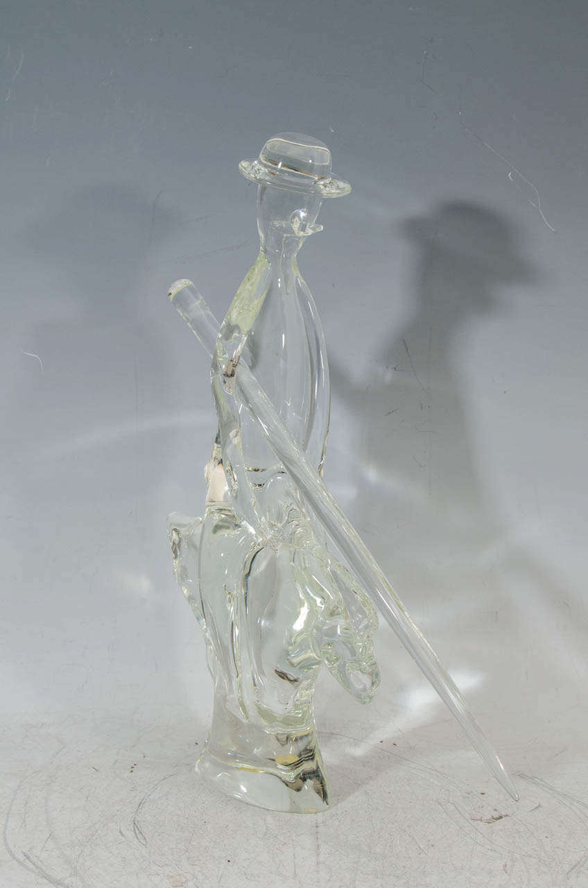 A vintage abstract Murano glass sculpture depicting a man mounted on a horse holding a sword.

In good vintage condition with age appropriate wear.