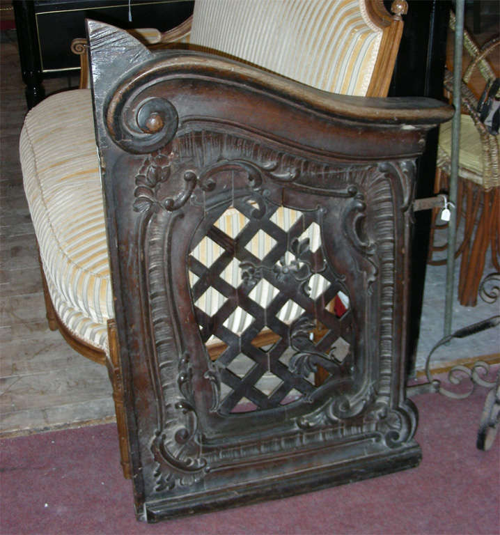 Two 19th century Louis XV style carved oak door elements, with original metal fittings.