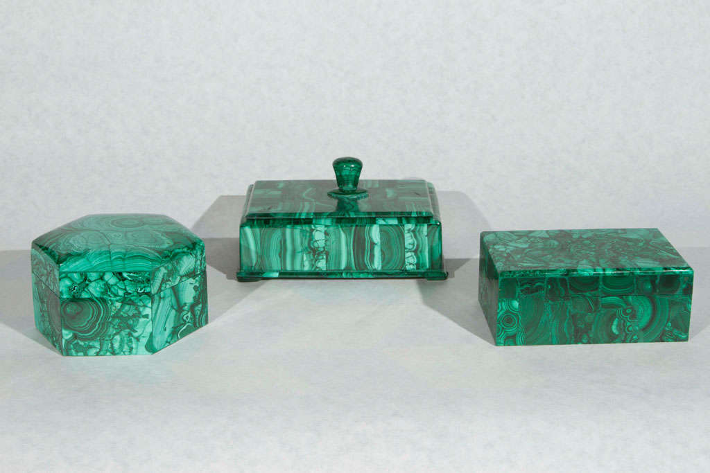 An instant collection of striking malachite boxes. Each box is priced individually. Large rectangular box with knobbed lid $650, small rectangular box $500, hexagon box $650.