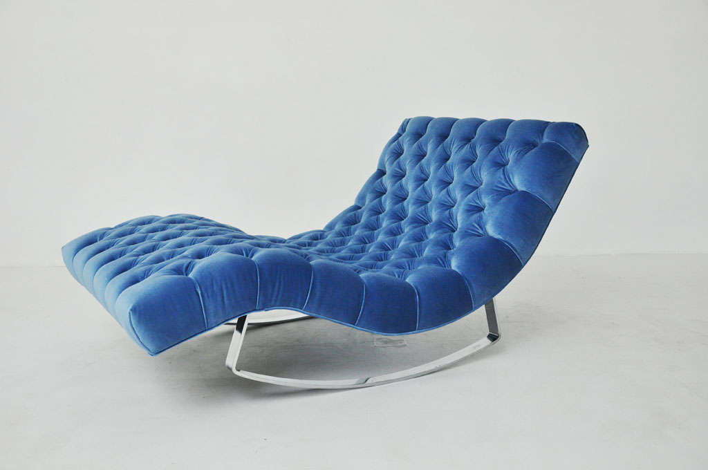 Rocking chaise by Adrian Pearsall.  High polish chrome base.  Newly upholstered in button tufted blue velvet.
