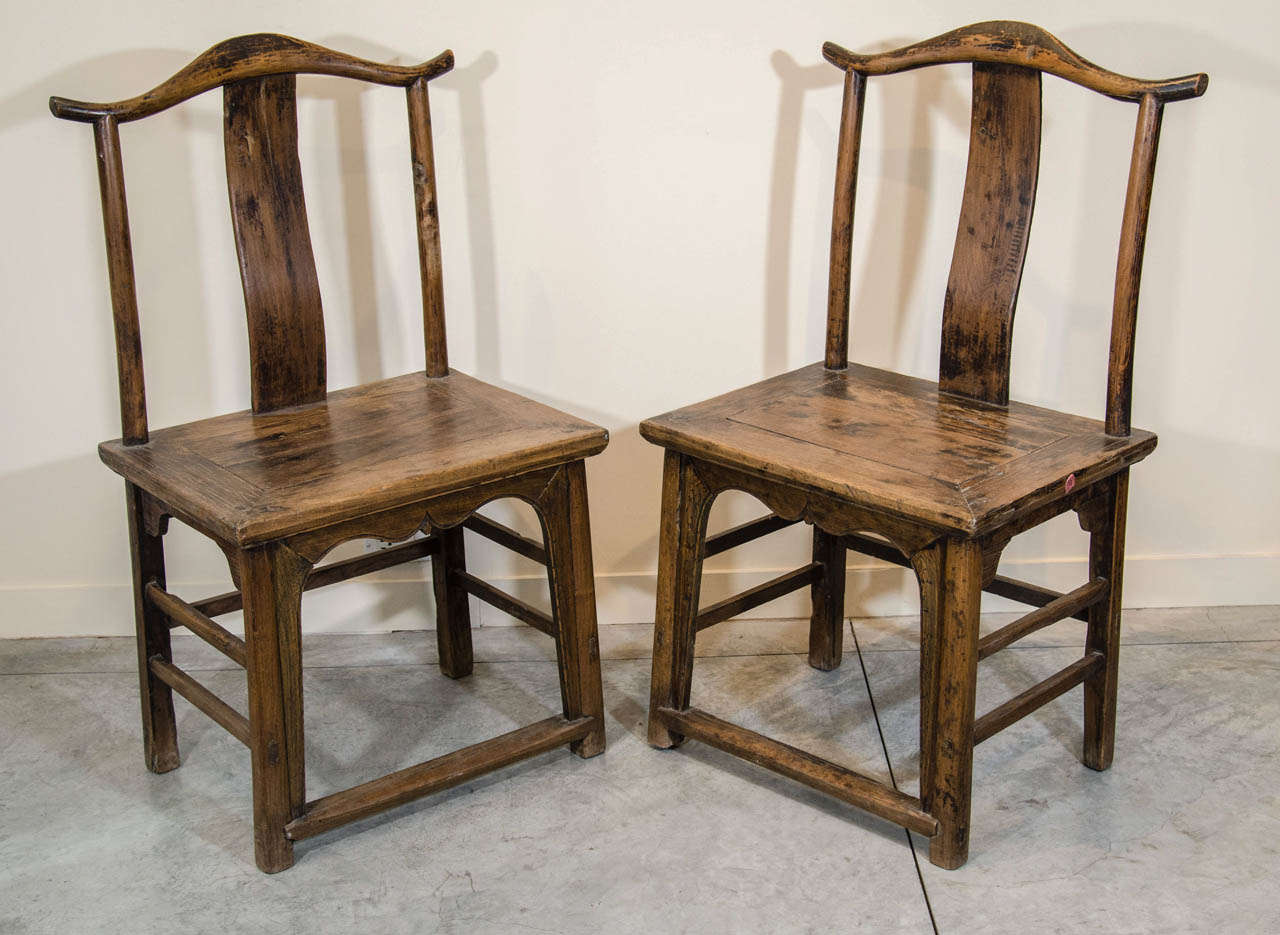 A classically proportioned pair of antique elm Chinese side chairs from Shanxi Province, circa 1900. Beautiful patina.
CH350