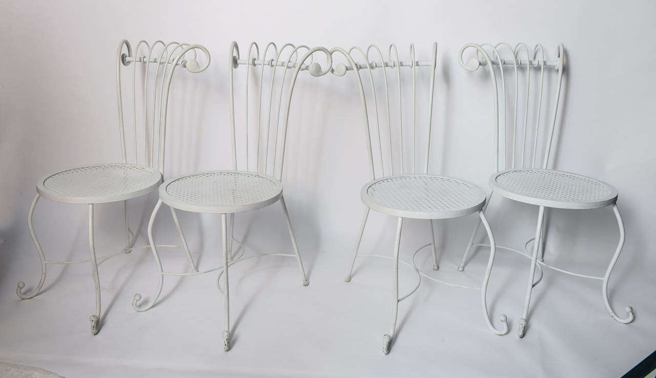 American Set of Four 1940's Hollywood Regency White Wrought Iron Chairs