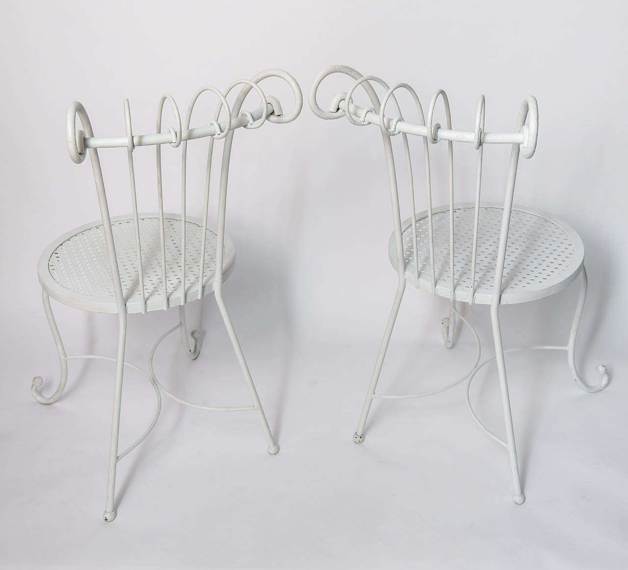 Mid-20th Century Set of Four 1940's Hollywood Regency White Wrought Iron Chairs