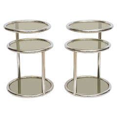 A Pair of Late Art Deco Chrome & Smoked Glass Swivel Tables by Glibert Rohde