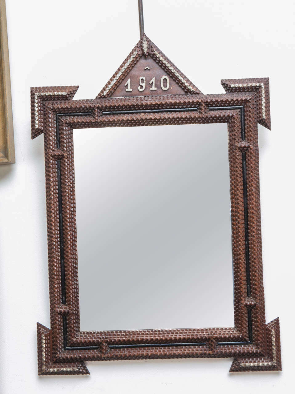 An American pair of Tramp Art Frames, with the comemeration of the year 1910 wich might have been to represent a special event or occasion. These frames are made in the tramp art manner, with layered hand cut geometric designs  having an unusual and